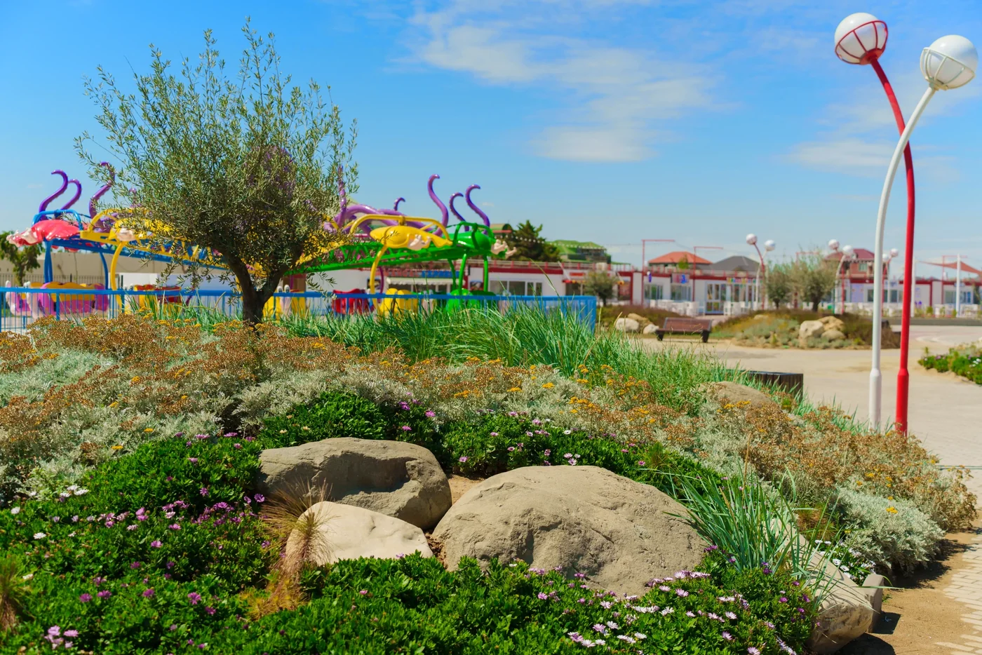 Flower beds with rides beyond the lawn